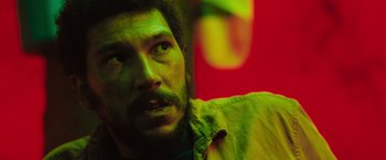 Movie still from “In the Earth” (2021), directed by Ben Wheatley – A person with a beard; Close Up shot, Low angle