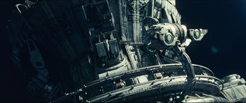 Movie still from “Independence Day: Resurgence” (2016), directed by Roland Emmerich – An aerial view of a city with a train on the tracks; Extreme Wide shot, Overhead angle