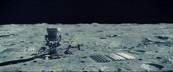 Movie still from “Independence Day: Resurgence” (2016), directed by Roland Emmerich – An image of an astronaut on the surface of the moon; Extreme Wide shot, High angle