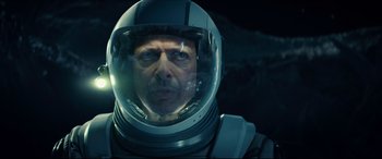 Movie still from “Independence Day: Resurgence” (2016), directed by Roland Emmerich – A person wearing a space suit; Close Up shot, Overhead angle