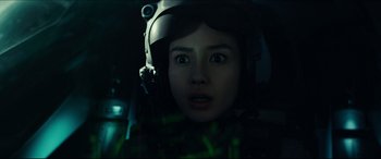 Movie still from “Independence Day: Resurgence” (2016), directed by Roland Emmerich – A woman in a helmet looking at the camera; Close Up shot, Over the shoulder angle
