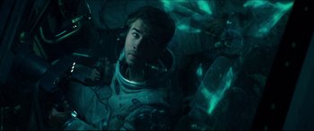 Movie still from “Independence Day: Resurgence” (2016), directed by Roland Emmerich – A man in a spacesuit in a space suit; Medium shot, Overhead angle