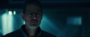 Movie still from “Independence Day: Resurgence” (2016), directed by Roland Emmerich – A person wearing glasses; Close Up shot, Low angle
