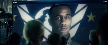 Movie still from “Independence Day: Resurgence” (2016), directed by Roland Emmerich – A man's face in front of a mirror; Close Up shot, Over the shoulder angle