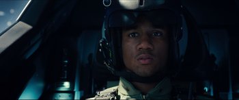 Movie still from “Independence Day: Resurgence” (2016), directed by Roland Emmerich – A person wearing a helmet; Close Up shot, Low angle