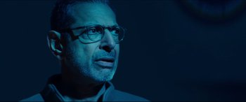 Movie still from “Independence Day: Resurgence” (2016), directed by Roland Emmerich – A person wearing glasses; Close Up shot, Low angle