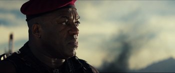 Movie still from “Independence Day: Resurgence” (2016), directed by Roland Emmerich – A person wearing a red hat; Close Up shot, Low angle