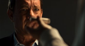 Movie still from “Inferno” (2016), directed by Ron Howard – A person smoking a cigarette; Close Up shot, Low angle