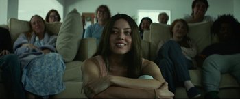Movie still from “Ingrid Goes West” (2017), directed by Matt Spicer – A group of people sitting in a living room; Close Up shot, Over the shoulder angle