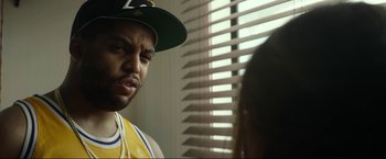 Movie still from “Ingrid Goes West” (2017), directed by Matt Spicer – A person wearing a hat; Close Up shot, Over the shoulder angle