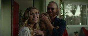 Movie still from “Ingrid Goes West” (2017), directed by Matt Spicer – A man and a woman holding a teddy bear; Close Up shot, Over the shoulder angle