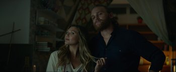 Movie still from “Ingrid Goes West” (2017), directed by Matt Spicer – A man and a woman are looking at the camera; Medium shot, Low angle
