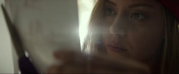 Movie still from “Ingrid Goes West” (2017), directed by Matt Spicer – A woman's face in a window light; Close Up shot, Low angle