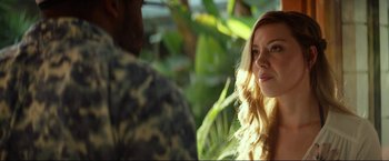 Movie still from “Ingrid Goes West” (2017), directed by Matt Spicer – A woman in a camouflage shirt is talking to a man in fatigues; Close Up shot, Over the shoulder angle