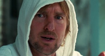 Movie still from “Inherent Vice” (2014), directed by Paul Thomas Anderson – A person wearing a towel; Close Up shot, Low angle