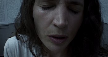 Movie still from “Inland Empire” (2006), directed by David Lynch – A woman's eyes and face; Extreme Close Up shot, Overhead angle