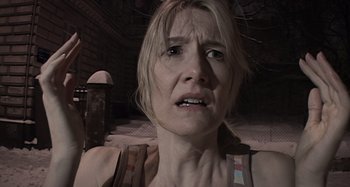 Movie still from “Inland Empire” (2006), directed by David Lynch – A person with her mouth wide open; Close Up shot, Overhead angle