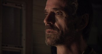 Movie still from “Inland Empire” (2006), directed by David Lynch – A person with a beard; Close Up shot, Over the shoulder angle