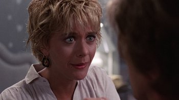 Movie still from “Innerspace” (1987), directed by Joe Dante – A person talking to another person; Close Up shot, Over the shoulder angle