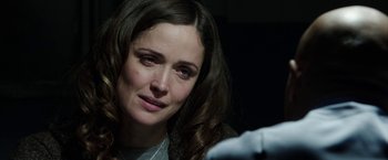 Movie still from “Insidious: Chapter 2” (2013), directed by James Wan – A person looking sad; Close Up shot, Over the shoulder angle