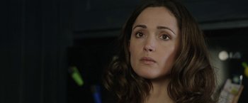 Movie still from “Insidious: Chapter 2” (2013), directed by James Wan – A person looking at the camera; Close Up shot, Over the shoulder angle