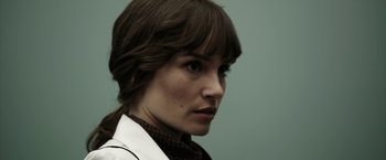 Movie still from “Insidious: Chapter 2” (2013), directed by James Wan – A person wearing a white shirt and tie; Close Up shot, Low angle