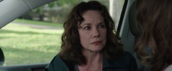 Movie still from “Insidious: Chapter 2” (2013), directed by James Wan – A person sitting in a car; Close Up shot, Over the shoulder angle