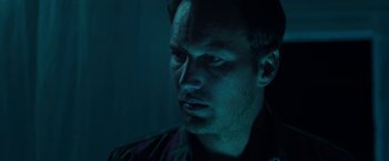 Movie still from “Insidious: Chapter 2” (2013), directed by James Wan – A person looking at the camera; Close Up shot, Low angle