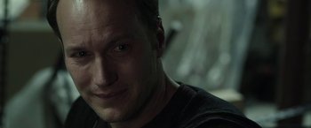 Movie still from “Insidious: Chapter 2” (2013), directed by James Wan – A man's face in the dark; Close Up shot, Over the shoulder angle