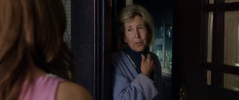 Movie still from “Insidious: Chapter 3” (2015), directed by Leigh Whannell – An older woman standing in front of a window; Close Up shot, Over the shoulder angle