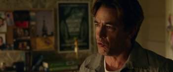 Movie still from “Insidious: Chapter 3” (2015), directed by Leigh Whannell – A person in a dark room; Close Up shot, Over the shoulder angle