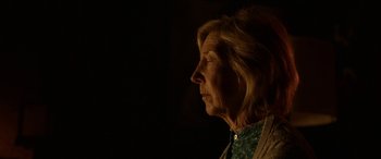 Movie still from “Insidious: Chapter 3” (2015), directed by Leigh Whannell – An older woman is looking into the distance; Close Up shot, Low angle