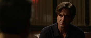 Movie still from “Insidious: Chapter 3” (2015), directed by Leigh Whannell – A person sitting in front of a window; Close Up shot, Over the shoulder angle