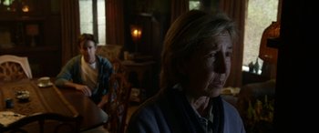 Movie still from “Insidious: Chapter 3” (2015), directed by Leigh Whannell – An older woman sitting in front of a young man; Close Up shot, Over the shoulder angle