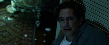 Movie still from “Insidious: Chapter 3” (2015), directed by Leigh Whannell – A person wearing a jacket; Close Up shot, Over the shoulder angle