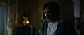 Movie still from “Insidious: Chapter 3” (2015), directed by Leigh Whannell – A person wearing a white t shirt; Close Up shot, Over the shoulder angle