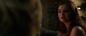 Movie still from “Insidious: Chapter 3” (2015), directed by Leigh Whannell – A woman sitting in front of a mirror; Close Up shot, Over the shoulder angle