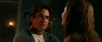 Movie still from “Insidious: Chapter 3” (2015), directed by Leigh Whannell – A person talking to another person; Close Up shot, Over the shoulder angle