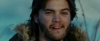 Movie still from “Into the Wild” (2007), directed by Sean Penn – A person with a beard; Close Up shot, Over the shoulder angle
