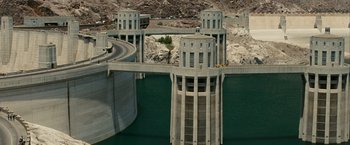 Movie still from “Into the Wild” (2007), directed by Sean Penn – A view of a bridge that is going over a river; Extreme Wide shot, High angle