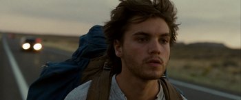 Movie still from “Into the Wild” (2007), directed by Sean Penn – A person with a backpack; Close Up shot, Low angle