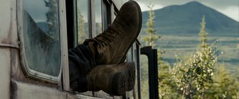 Movie still from “Into the Wild” (2007), directed by Sean Penn – A pair of shoes hanging from a window sill; Medium shot, Low angle