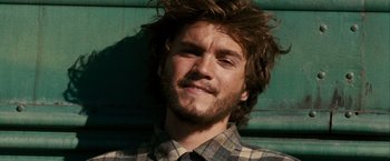 Movie still from “Into the Wild” (2007), directed by Sean Penn – A person wearing a plaid shirt; Close Up shot, Low angle