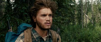 Movie still from “Into the Wild” (2007), directed by Sean Penn – A person wearing a plaid shirt; Close Up shot, Over the shoulder angle