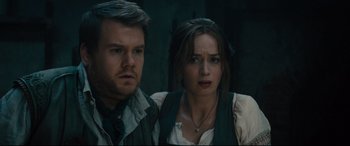 Movie still from “Into the Woods” (2014), directed by Rob Marshall – A man and a woman standing next to each other; Close Up shot, Over the shoulder angle