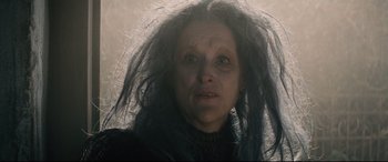 Movie still from “Into the Woods” (2014), directed by Rob Marshall – A person with long black hair; Close Up shot, Low angle