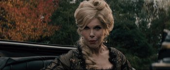 Movie still from “Into the Woods” (2014), directed by Rob Marshall – A person with long blonde hair; Close Up shot, Over the shoulder angle