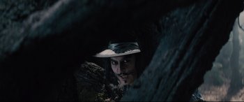 Movie still from “Into the Woods” (2014), directed by Rob Marshall – A man with a mustache wearing a cowboy hat; Close Up shot, Low angle