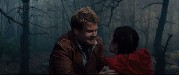 Movie still from “Into the Woods” (2014), directed by Rob Marshall – A man and a little girl are smiling at each other; Medium shot, Over the shoulder angle