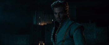 Movie still from “Into the Woods” (2014), directed by Rob Marshall – A person wearing a jacket; Medium shot, Over the shoulder angle